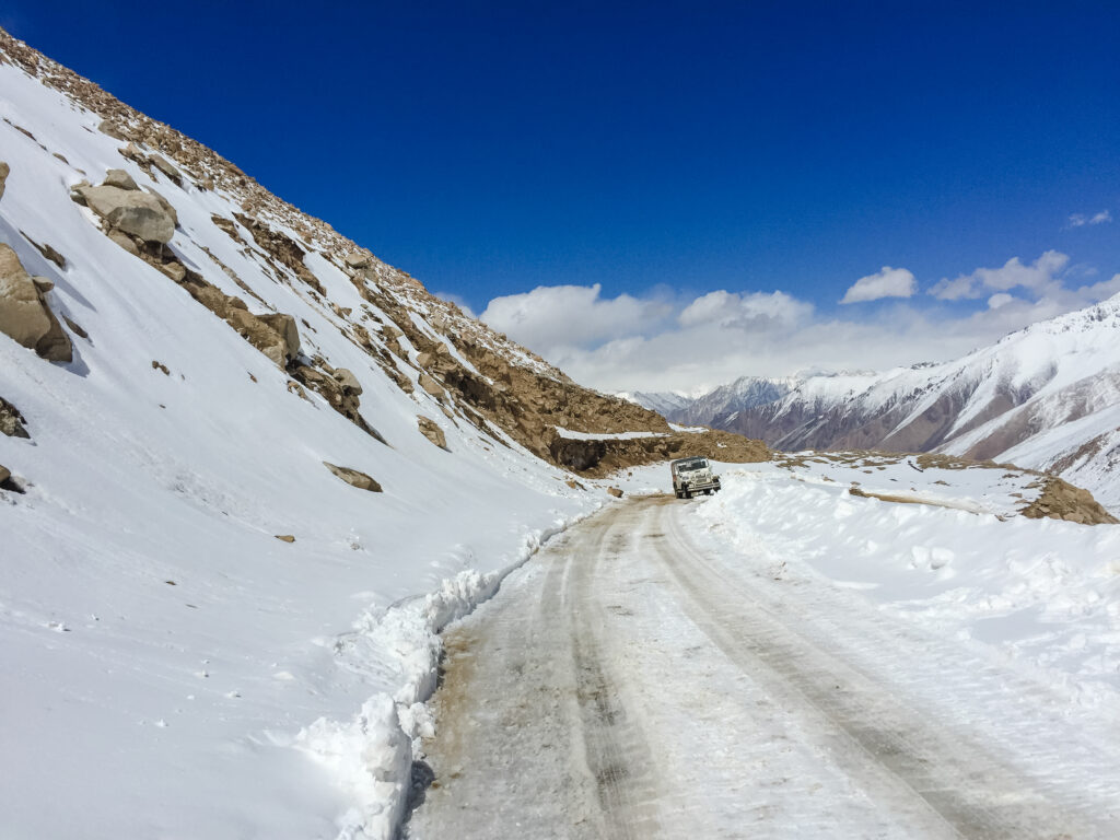 places to visit in India, best places to visit in India in June Valley of Flowers trek in June" and "Ladakh road trip scenery"